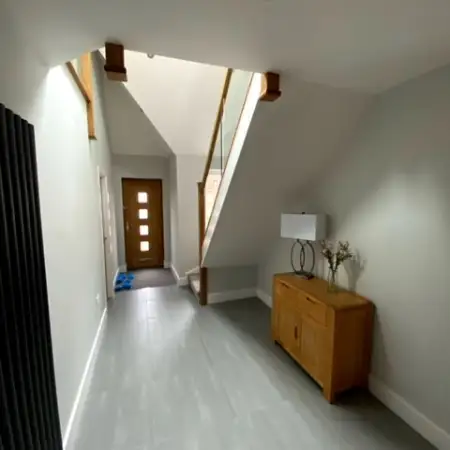 stairs stright up in the hallway of a Bungalow: Click Here To View Larger Image